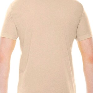 May include: A plain, light beige t-shirt with short sleeves.