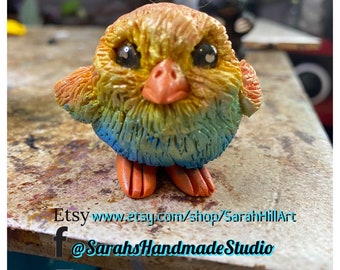 Handmade polymer sculpture of chick by Sarah Hill