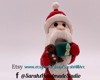 Handmade little Santa with mug and gingerbread cookie sculpture ornament by Sarah Hill