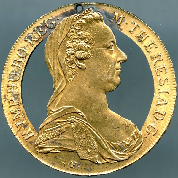 Maria Theresa Thaler Cut out coin with gold wash.