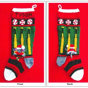 May include: A red and green knitted Christmas stocking with the name "TYSON" on the front. The stocking features a baseball theme with bats and balls. The stocking is decorated with a small, white, knitted snowman.