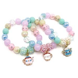 Pastel tea party birthday bracelets party favors, mixed charms