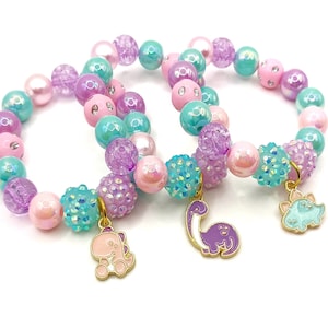 Pastel dinosaur bracelets, Girls trex birthday party favors