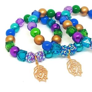 Girl&#39;s peacock bracelets party favors gold feather birthday