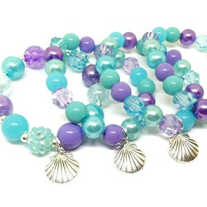 Seashell bracelets party favors in organza bags with a special birthday girl bracelet