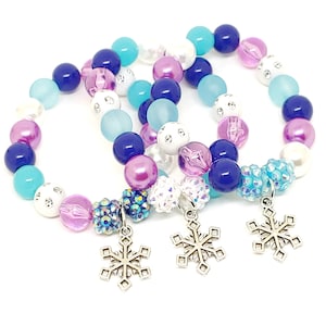 Snowflake bracelets party favors in organza bags, Girls Winter birthday