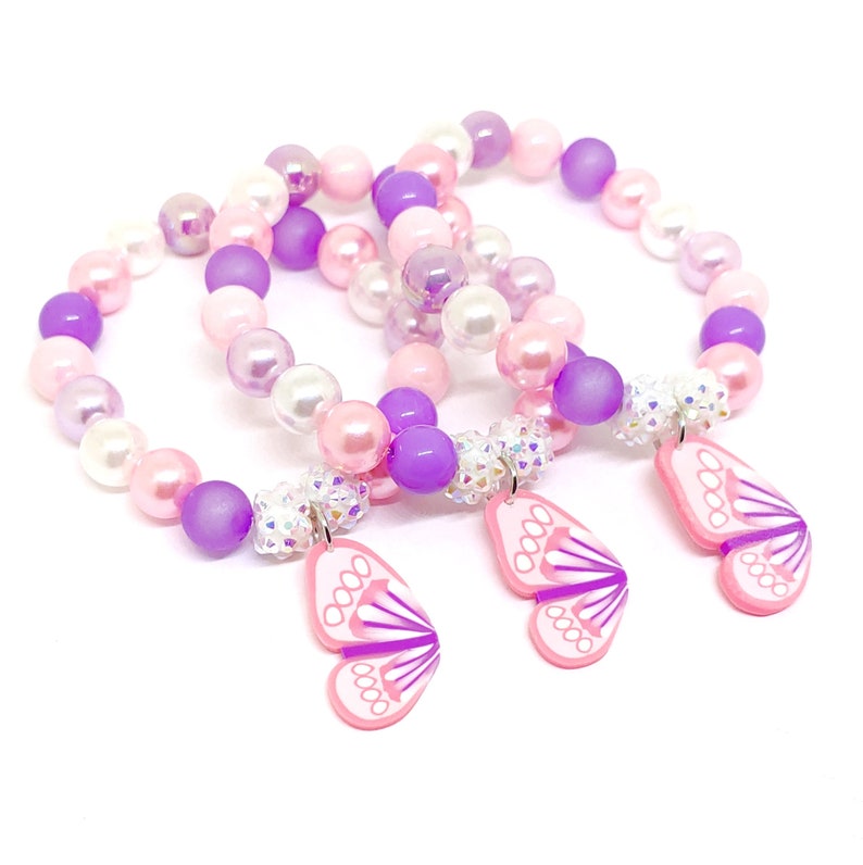 Butterfly bracelets favors in organza bags Garden birthday supplies