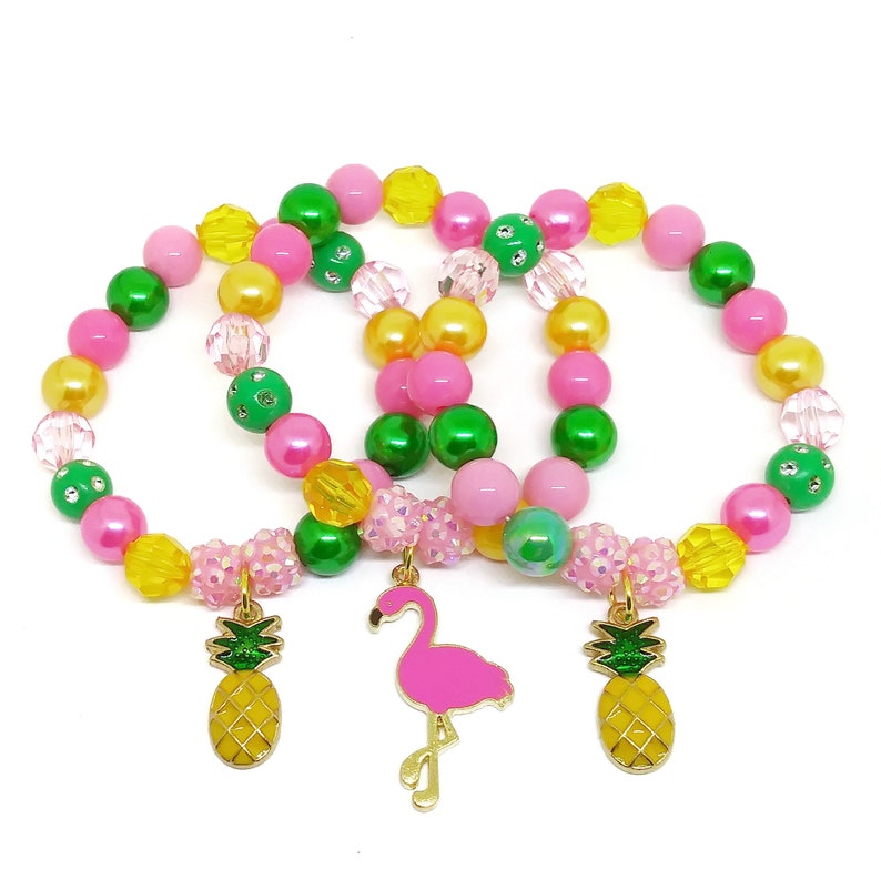 Pineapple and flamingo bracelets party favors in organza bags image 0