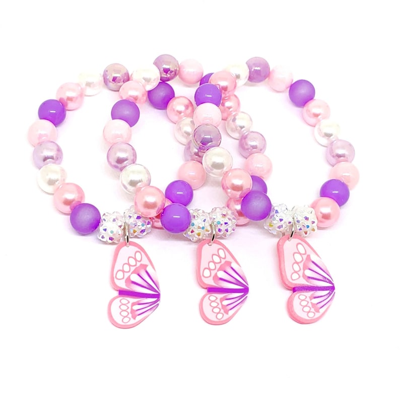 Butterfly bracelets favors in organza bags Garden birthday supplies