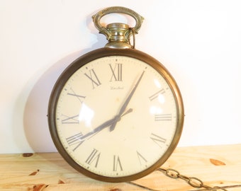 Antique pocket shop watch wall clock