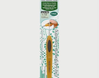 May include: A steel crochet hook with a yellow ergonomic handle and a black oval grip. The packaging includes text in multiple languages, including "Soft Touch Steel Crochet Hook" and "Easy & Ergonomic Crocheting". The hook size is No. 12, 0.60mm.