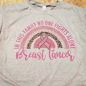 In this family no one fights alone breast cancer tee - sublimation shirt - breast cancer - pink ribbon
