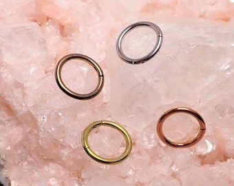 18g Implant Grade Titanium Clicker · Septum, Helix, Cartilage, Tragus, Daith, Lip, Nose, · 6mm, 8mm, 10mm