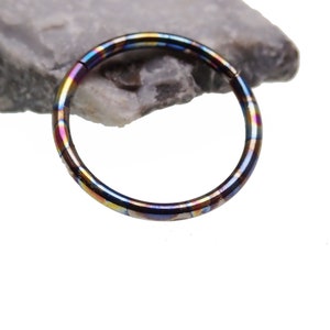 Oil Slick Anodized Titanium Clicker 18g, 16g, 14g, 12g, 10g · Septum, Helix, Cartilage, Tragus, Daith, Lip · 6mm, 7mm, 8mm, 10mm, 12mm, 14mm