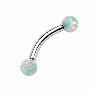 May include: A curved barbell body jewelry piece featuring a polished silver-tone metal shaft with a spherical opal bead at each end. The opal beads display a translucent white base with iridescent flashes of light blue, pink, and green color.
