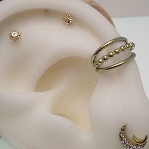 Triple Hoop 7mm, 9mm Titanium Clicker · Cartilage, Conch, Daith, Helix, Lip, Septum · 16g