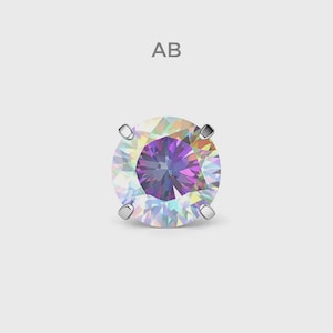 May include: A single, round, iridescent gemstone with a silver setting. The gem displays a spectrum of colours, including purple, blue, and yellow, and is set against a light grey background. The letters "AB" are above the gem.