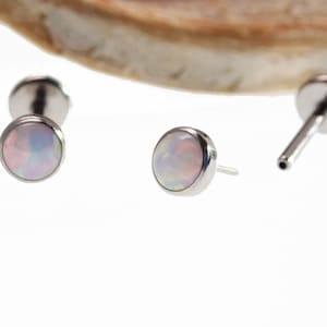 titanium  threadless push fit white fire opal flat back 18g ,16 or 14g (sold in singles)