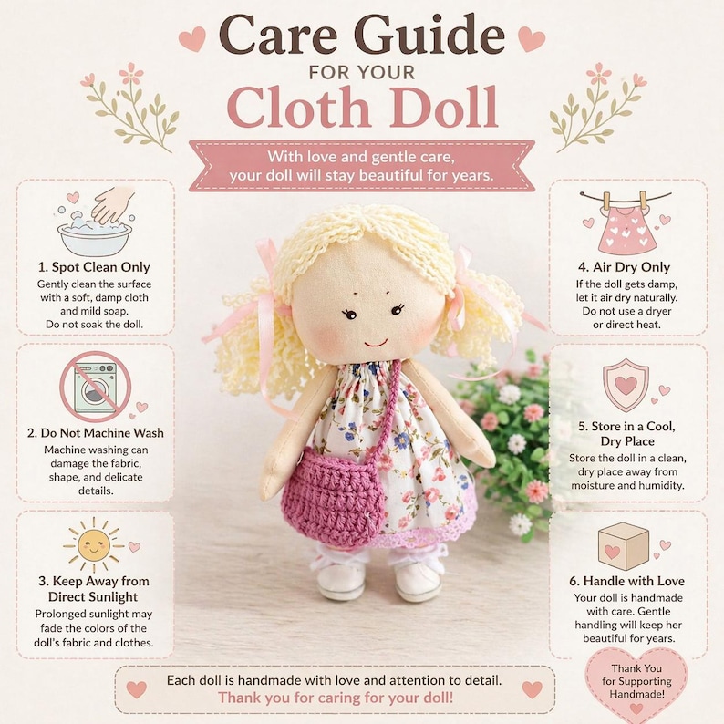 May include: A handmade cloth doll with blonde yarn hair and a floral dress. The doll has a pink crocheted purse and white shoes. The image includes a care guide with instructions for cleaning and storage.