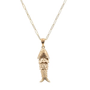 This handmade Gold Filled Fish Necklace is crafted in Belgium, featuring articulated fish design attached on an elegant chain. It is easy and safe to use.