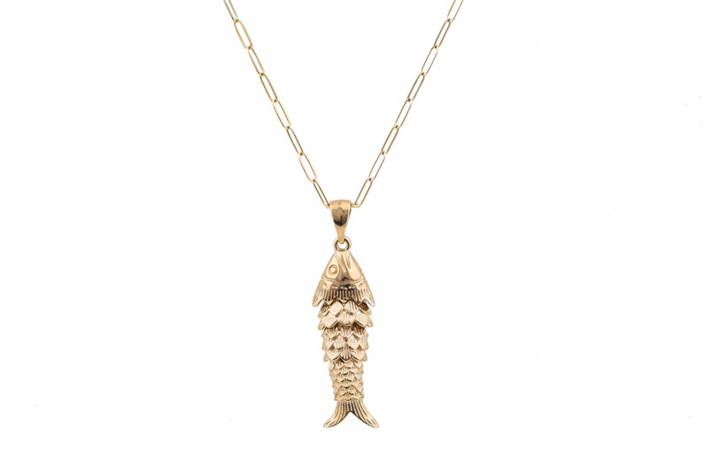 This handmade Gold Filled Fish Necklace is crafted in Belgium, featuring articulated fish design attached on an elegant chain. It is easy and safe to use.