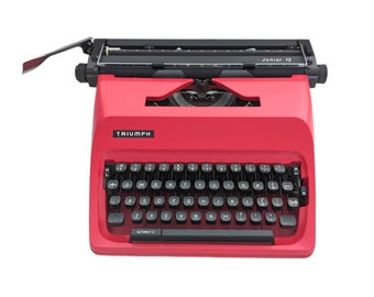 SALE!* A Triumph Junior 12 typewriter, red typewriter from Triumph, a working and vintage portable typewriter, qwerty keyboard.