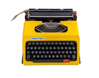 SALE!* Yellow Robotron Cella typewriter, a good working and vintage typewriter, a smaller ultraportable machine with qwertz.