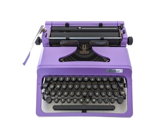 SALE!* Erika Model 30 typewriter, purple typewriter, a vintage portable desk typewriter from the 1980s with qwerty keyboard layout.