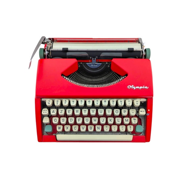 SALE!* Vintage Olympia SF Deluxe typewriter from the 1960s in good working condition, red colour, manual, French azerty keyboard.