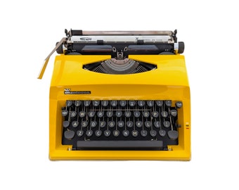 SALE!* Vintage Triumph Contessa DeLuxe typewriter, an original yellow typewriter with a qwerty keyboard, typewriter from 1970s