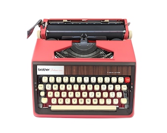 AANBIEDING!* Pink Brother Deluxe 1300 typemachine, een vintage handmatige en draagbare typemachine in goede werkende staat, typemachine uit de jaren 60.