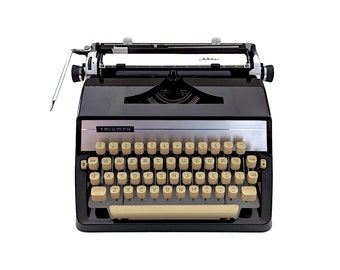 SALE!* Triumph Gabriele 25 typewriter, black typewriter from Triumph, a working and vintage and portable typewriter with qwerty.