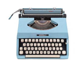 SALE!* Vintage smaller ultraportable Imperial Signet typewriter from the 1970s in good working condition, original light blue typewriter