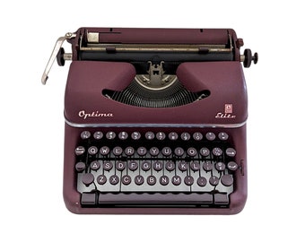 AUSVERKAUF!* Optima Elite-Schreibmaschine aus den 1950er Jahren, in gutem funktionsfähigen Zustand, Vintage-Schreibtischschreibmaschine, QWERTY-Tastatur, originale burgunderrote Schreibmaschine.