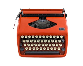 SALE!* Vintage Triumph Tessy typewriter in original orange colour, manual and portable typewriter with qwertz keyboard from 1970s.