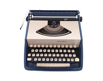 SALE!* Vintage portable Remington Envoy typewriter from the 1970s in good working condition, original vintage typewriter, blue and white.