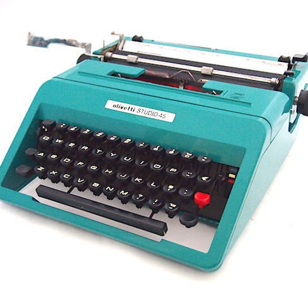 Olivetti studio 45 typewriter, olivetti typewriter, aquamarine blue green typewriter, in working state, colletors item, vintage typewriter.