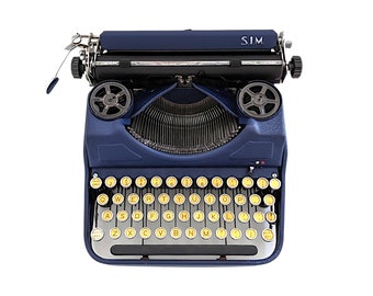 UITVERKOOP!* S.I.M. model 6 typemachine, vintage draagbare schrijfmachine voor schrijvers, in goede werkende staat, qwerty-toetsenbord, originele blauwe kleur.