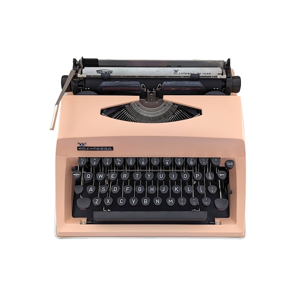 SALE!* Vintage Triumph Contessa De Luxe typewriter, a peachy pink orange typewriter with a qwerty keyboard, typewriter from 1970s.