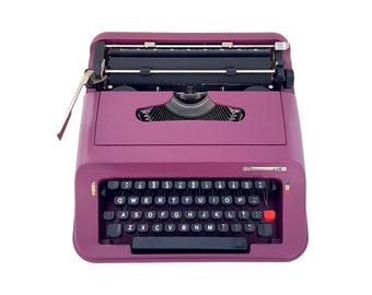 AANBIEDING!* Vintage handmatige Hema 44K typemachine uit de jaren 70 in goed werkende staat, een basis bureauschrijfmachine, paarse kleur, qwerty
