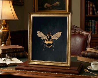 May include: A framed rectangular artwork featuring a detailed illustration of a bumblebee with yellow and black stripes and translucent wings, centred on a dark background, encased in a metallic gold frame with a classic, ornate profile.