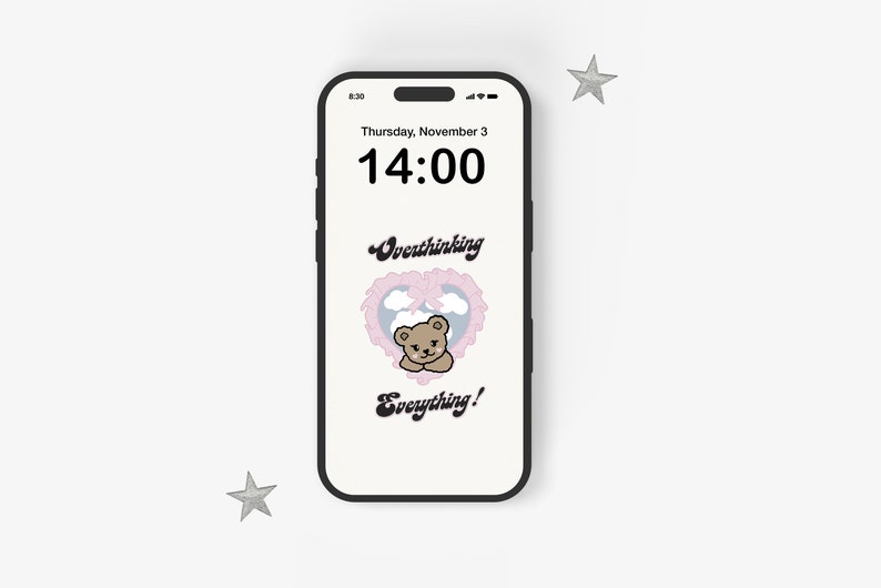 May include: A smartphone displaying a digital clock with the time 14:00 and the date Thursday, November 3. The background is a light pink with a cartoon bear in a heart-shaped frame. The text "Overthinking Everything!" is displayed below the bear.