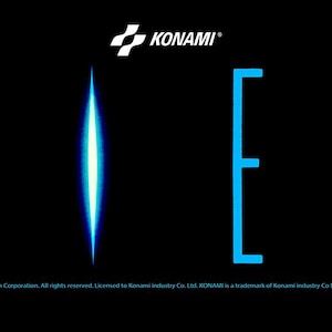 May include: A blue and white logo for the video game "Aliens" with the Konami logo in the top right corner.