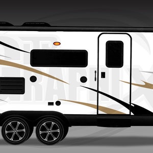 May include: A white travel trailer with black, gray, and gold decorative accents. The trailer has two axles, a door, and several windows. The design includes curved lines and geometric shapes, with a black undercarriage and wheels.