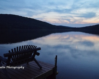 Sunset over Lake with a bench and dock photo - Calm, Peaceful spot to sit with sky reflection in lake - Wall Decor