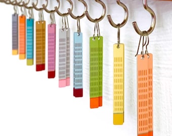 Pendientes pastel llamativos, ligeros, hipoalergénicos, de aluminio y titanio, estilo moderno y divertido.