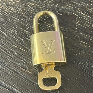 Louis Vuitton padlock lock and key #322 LV purse charm not polished