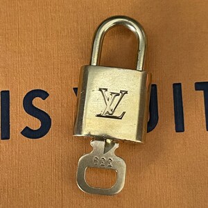 Etsy louis vuitton lock sale