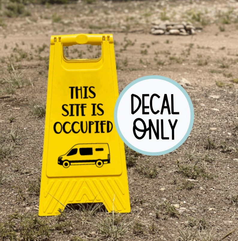 May include: Yellow caution sign with black text that reads "This site is occupied" and a black silhouette of a van. A blue circle with white text that reads "Decal Only" is to the right of the sign.