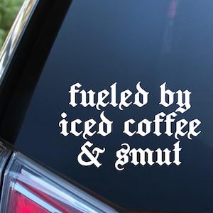 May include: A set of three ceramic mugs with a speckled, matte finish. The mugs are in shades of cream, light gray, and dark gray. Each mug has a simple, minimalist design, perfect for coffee or tea.